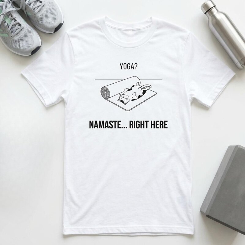 Namaste Right Here yoga cat t-shirt - lazy cat on yoga mat gift by The Cuddly Cat Company